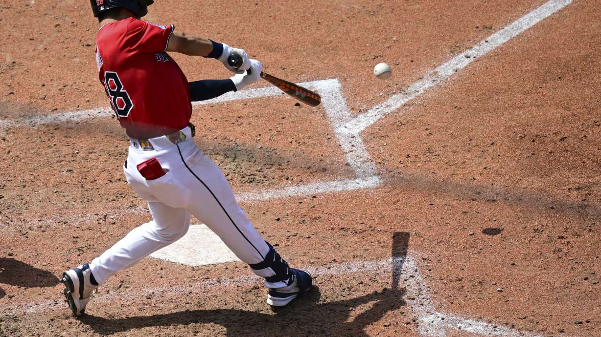 Cleveland Guardians' Steven Kwan hits a single during the fourth inning of a baseball game against the Atlanta Braves, Sunday, Aug. 17, 2025, in Cleveland.