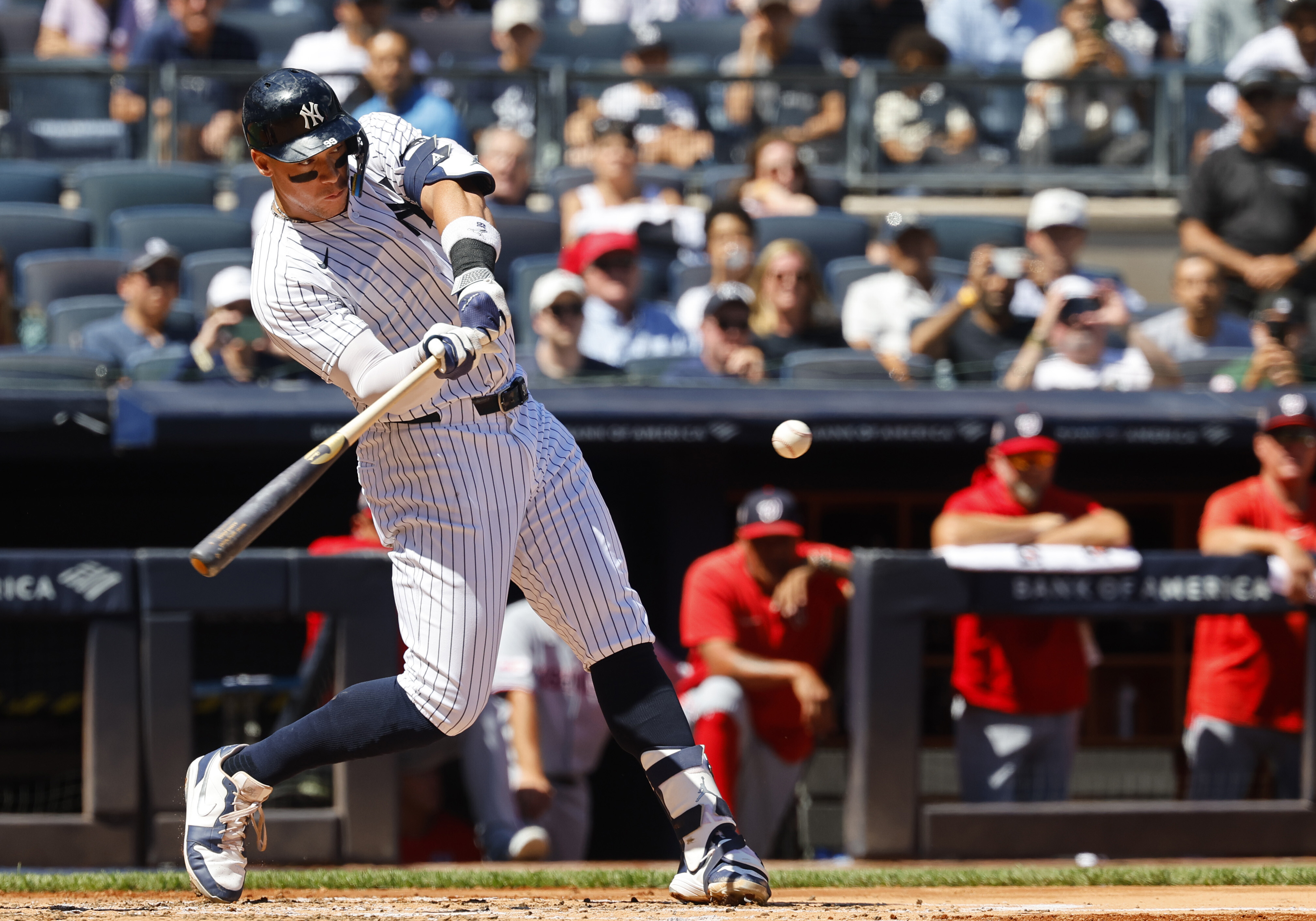 New York Yankees' Aaron Judge hits a two-run home run during the third inning of a baseball game against the Washington Nationals, Wednesday, Aug. 27, 2025, in New York. 
