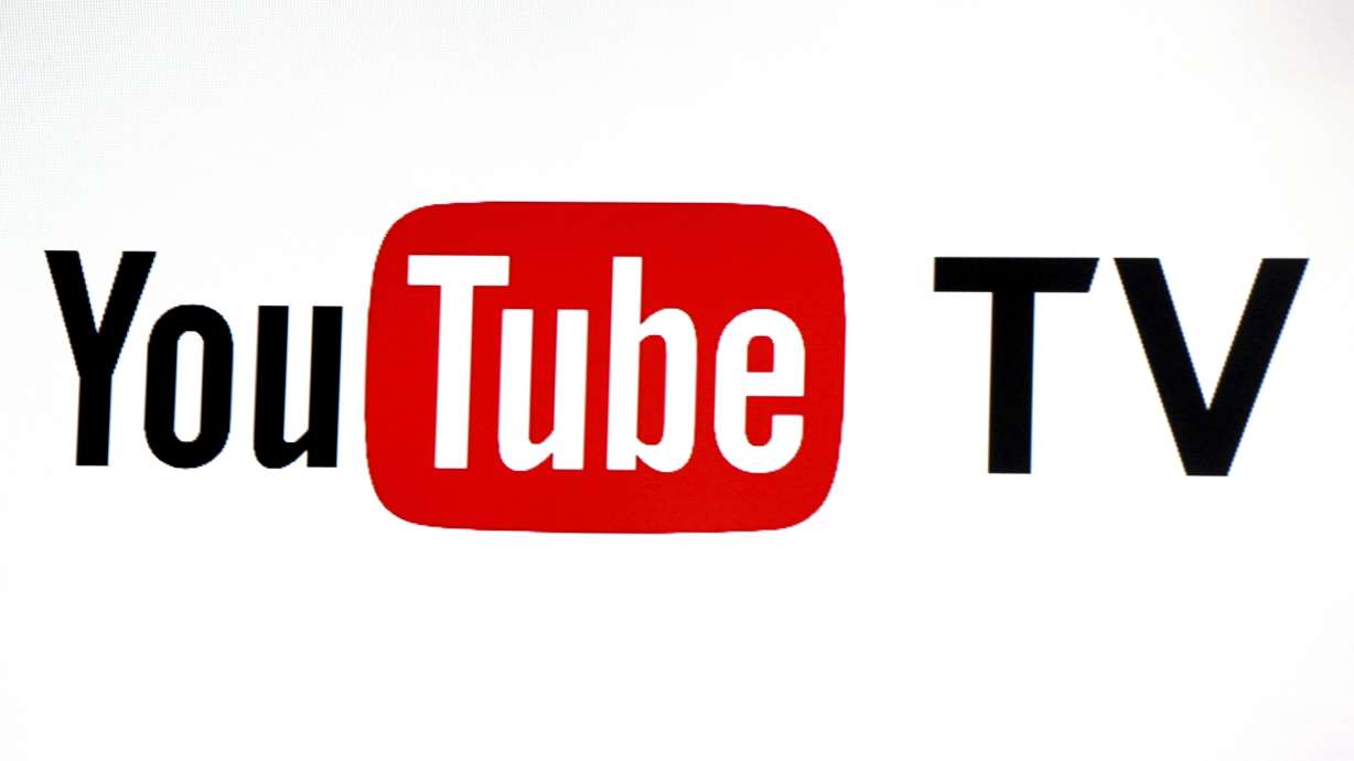 FILE - YouTube TV logo is seen at the YouTube Space LA in Los Angeles, Feb. 28, 2017.