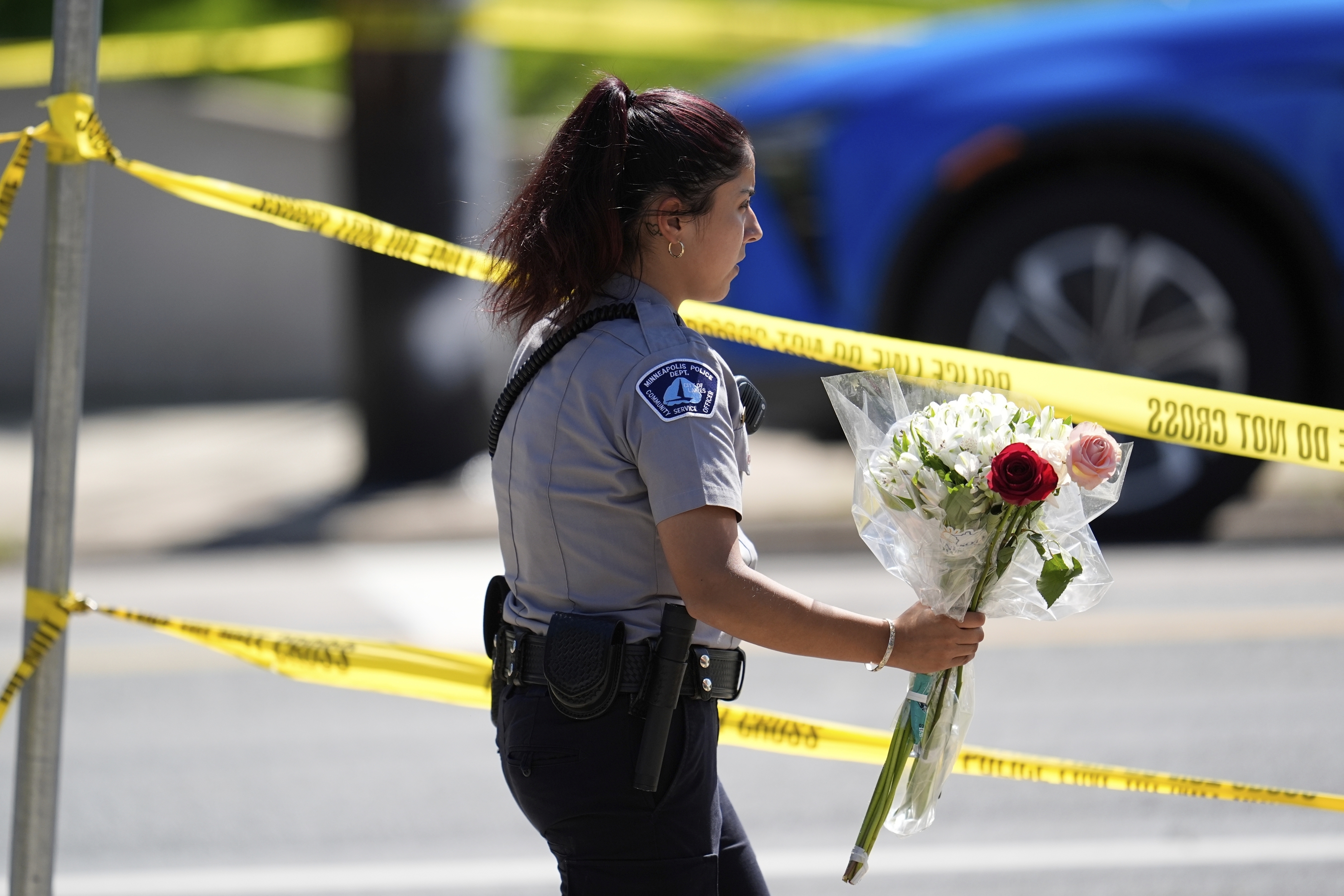 A shooting at a Minneapolis Catholic school kills 2 children, injures 17 people