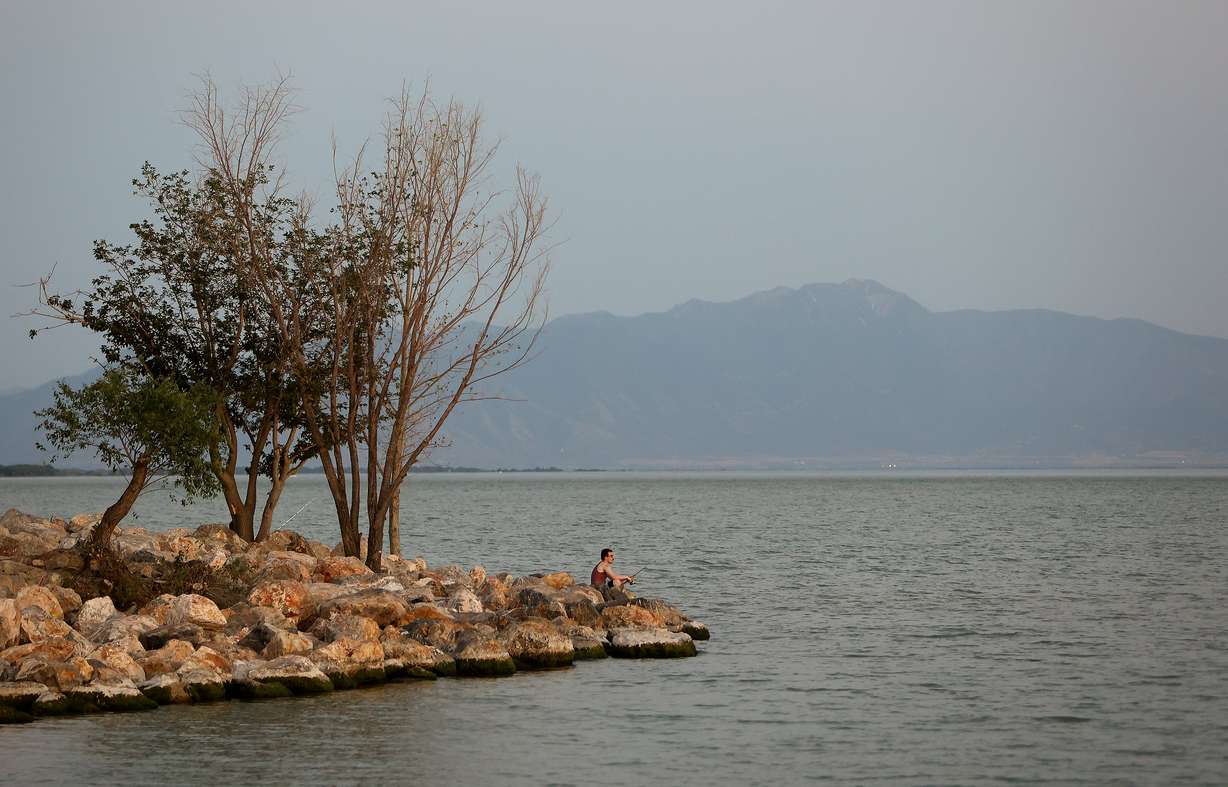 Jackson Moorehead fishes in Utah Lake at American Fork Boat Harbor on June 30. Rep. Mike Kennedy earmarked funding to help address the issues at Utah Lake and the Great Salt Lake on Wednesday.