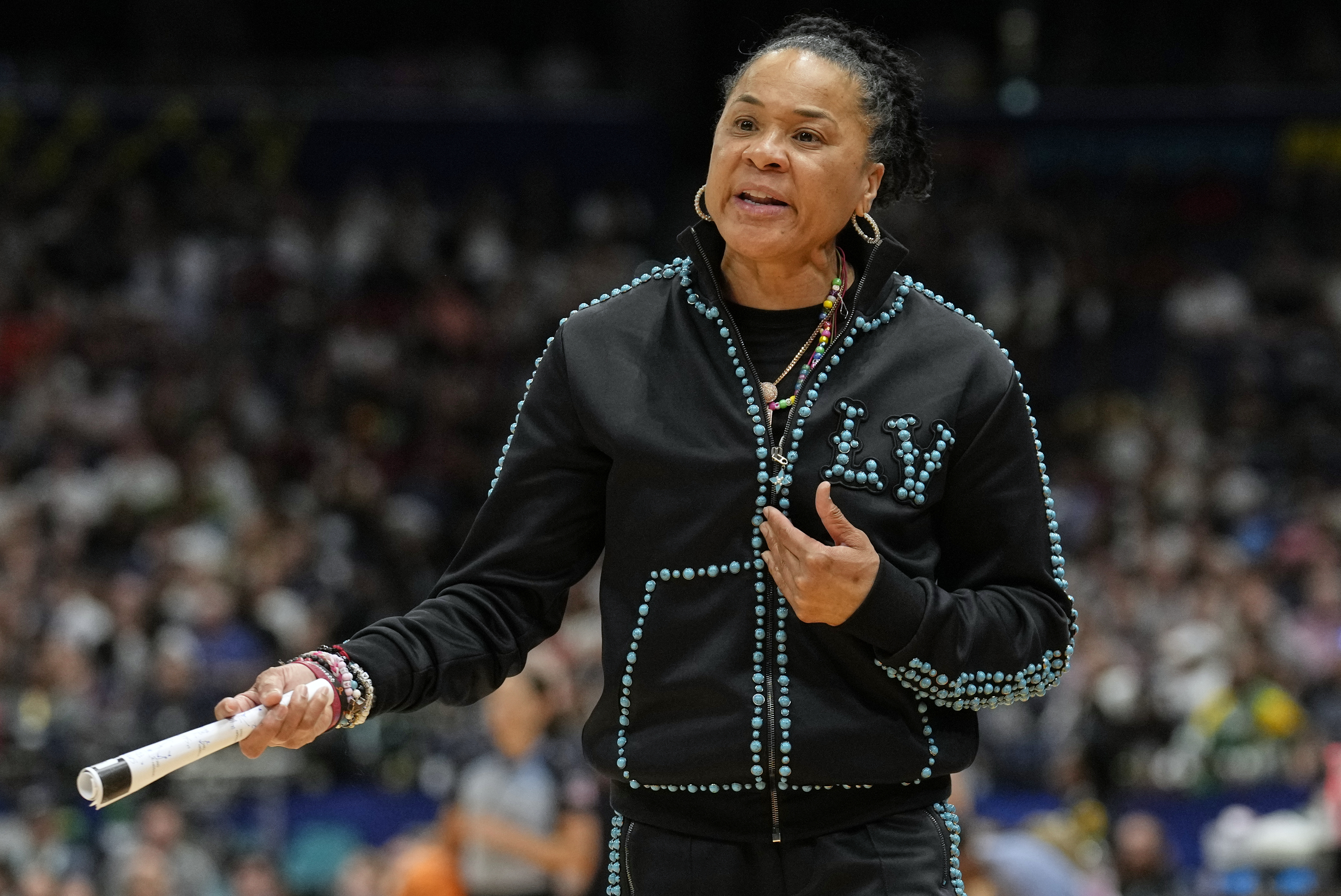 FILE - South Carolina head coach Dawn Staley reacts during the first half of the national championship game against UConn at the Final Four of the women's NCAA college basketball tournament, April 6, 2025, in Tampa, Fla. 