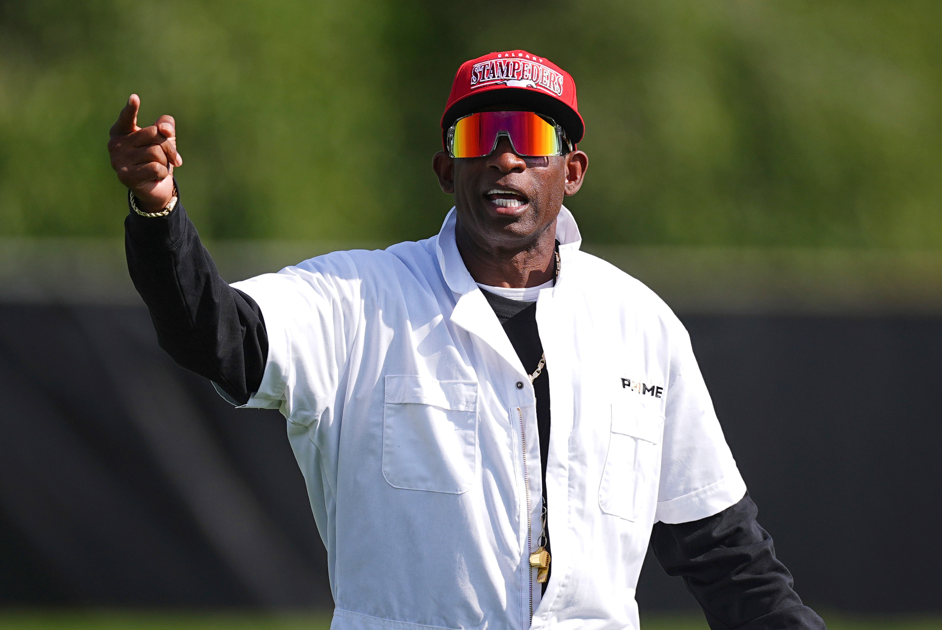 Colorado head coach Deion Sanders directs players during an NCAA college football practice Thursday, Aug. 14, 2025, in Boulder, Colo.