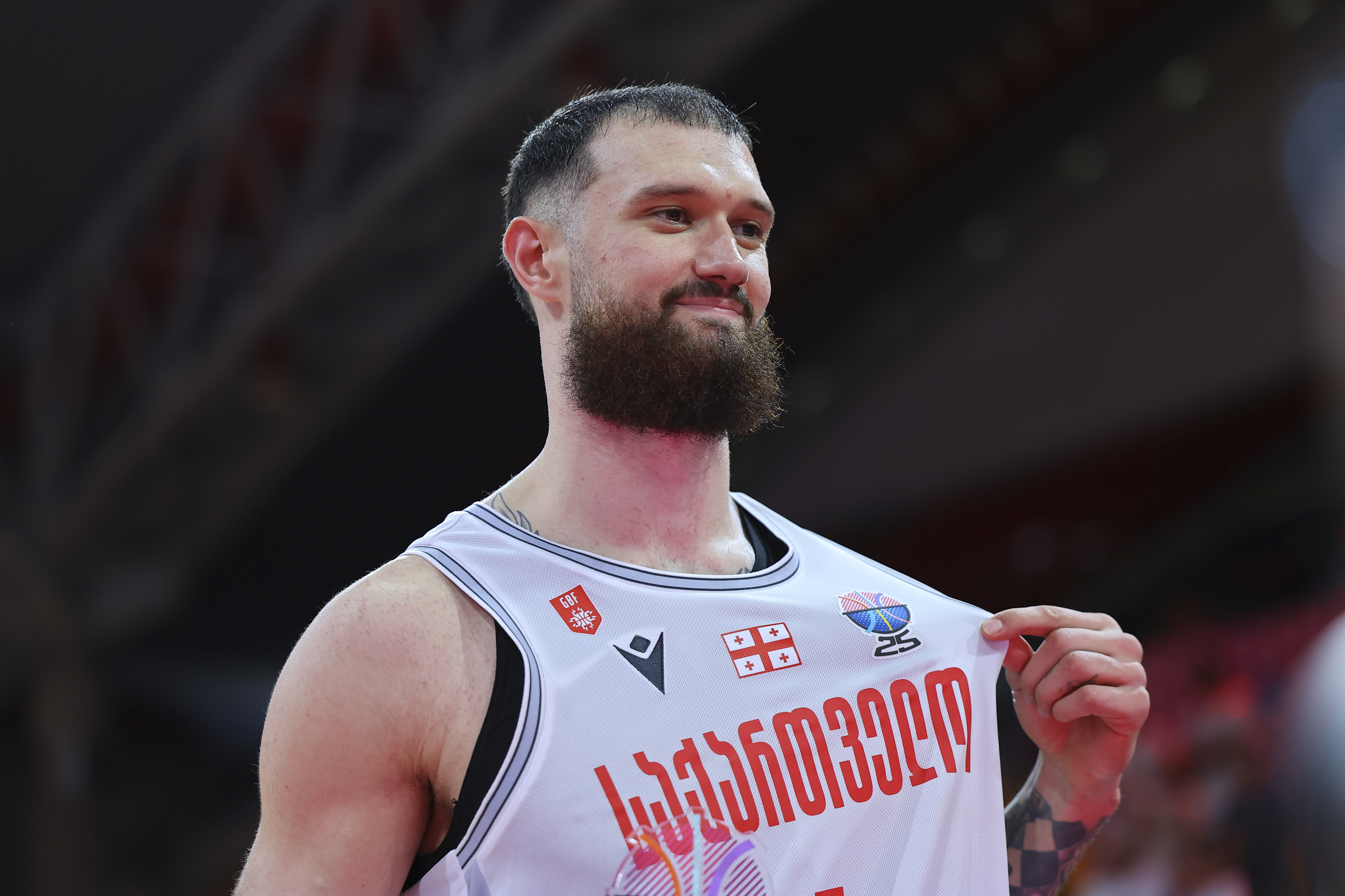 Georgia's Alexander Mamukelashvili celebrates after his team won Spain during the Eurobasket, European Basketball Championship Group C match between Spain and Georgia at the Spyros Kyprianou Arena in Limassol, Cyprus, Thursday, Aug. 28, 2025.