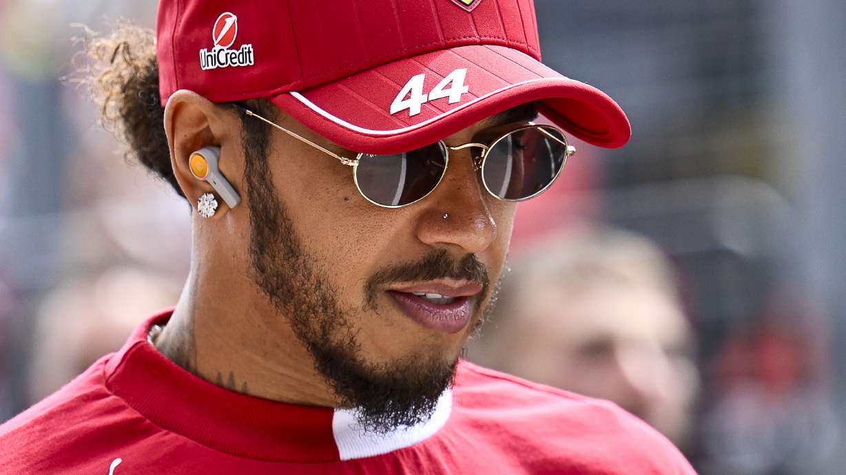 Ferrari driver Lewis Hamilton of the United Kingdom arrives to the drivers parade at the Hungaroring racetrack, in Mogyorod, Hungary, Sunday, Aug. 3, 2025, ahead of the Hungarian Formula One Grand Prix.