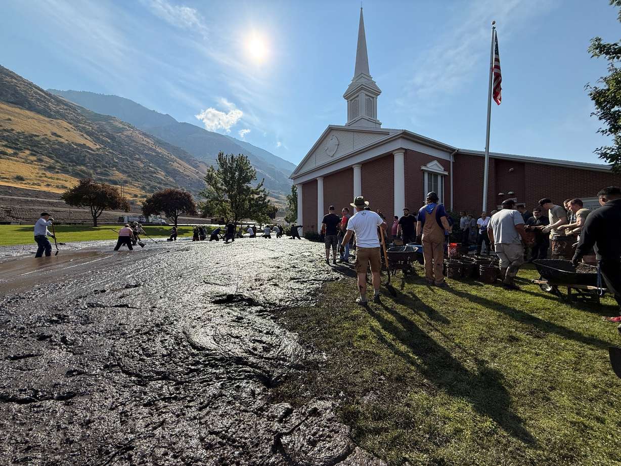 People work to clean up after a mudslide in Provo near the Buckley Draw Fire burn scar, Thursday, Aug. 28. Cleanup efforts continued throughout Provo on Tuesday, nearly a week after the slide.
