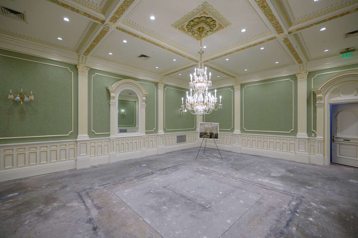 A chandelier is installed in a large sealing room in the north addition of the Salt Lake Temple on Aug. 6.