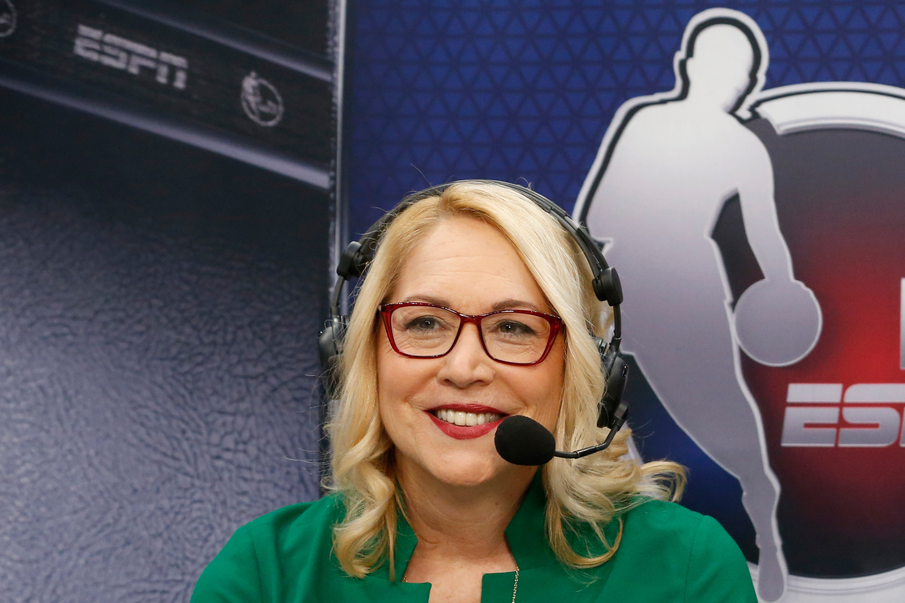 ESPN announcers Doris Burke works before an NBA basketball game between the New Orleans Pelicans and the Dallas Mavericks in Dallas, Wednesday, March 4, 2020. 