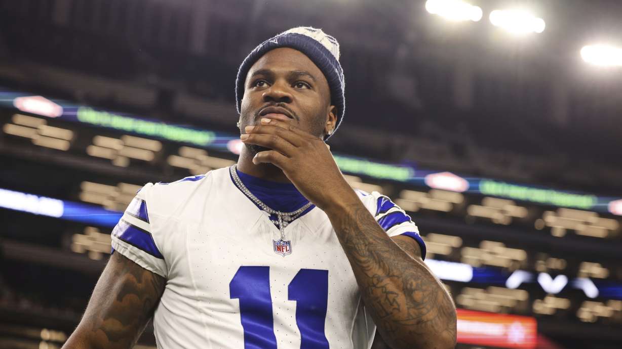 Dallas Cowboys defensive end Micah Parsons walks onto the field after the team's preseason NFL football game against the Baltimore Ravens Saturday, Aug. 16, 2025, in Arlington, Texas.
