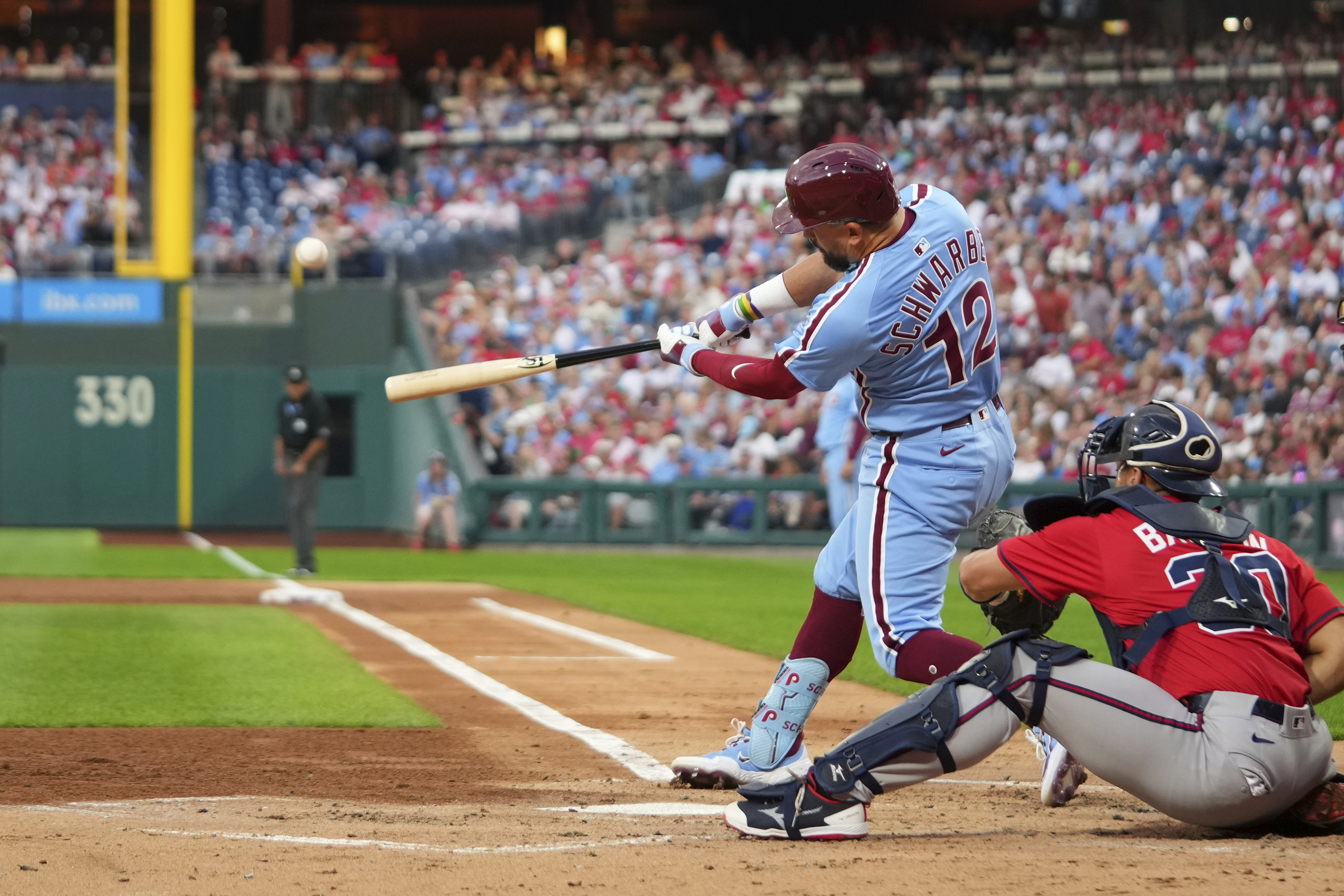 Philadelphia Phillies' Kyle Schwarber hits a home run against Atlanta Braves pitcher Cal Quantrill during the first inning of a baseball game Thursday, Aug. 28, 2025, in Philadelphia. 