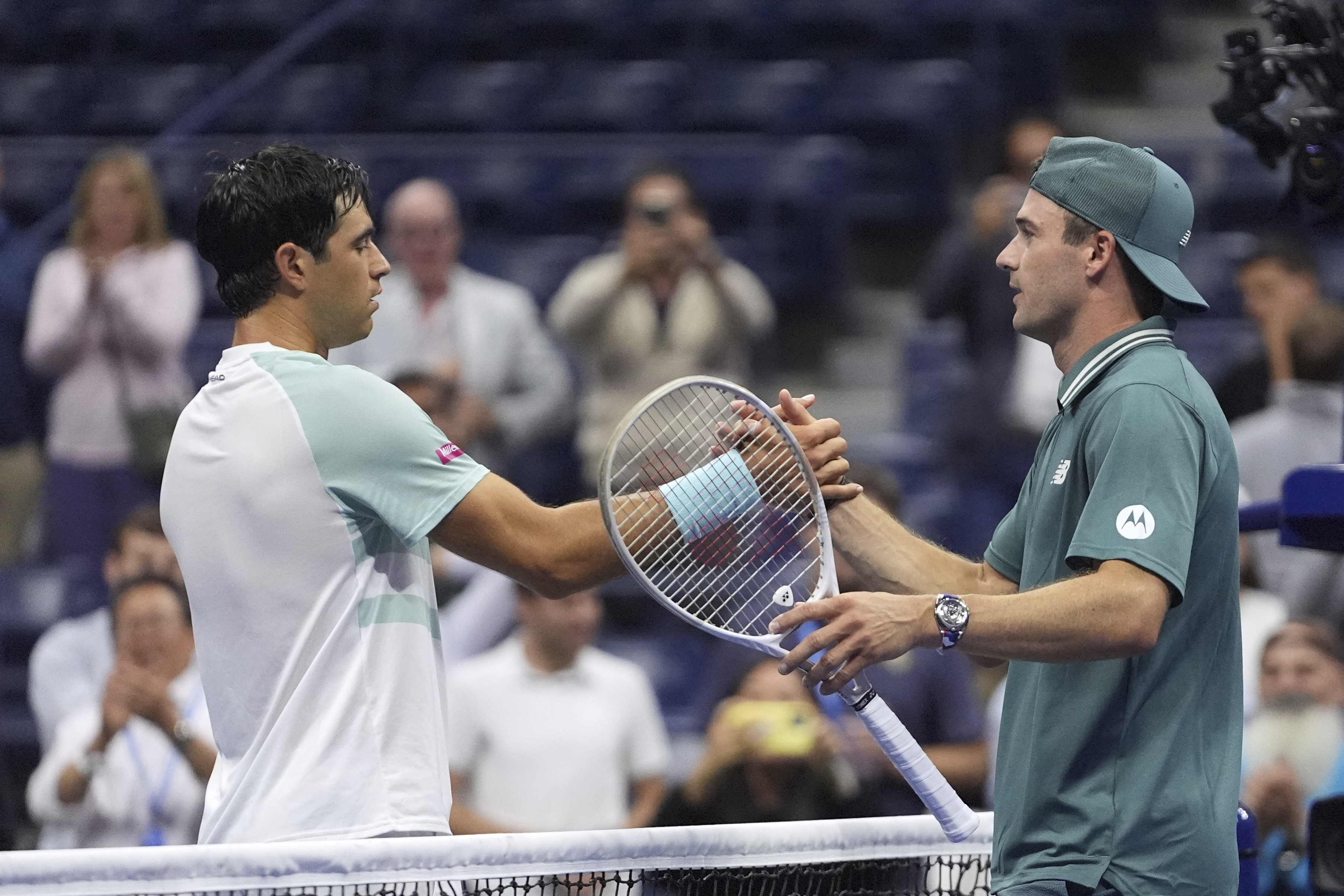 Nuno Borges, left, of Portugal, congratulates Tommy Paul, of the United States, after being defeated by him during the second round of the U.S. Open tennis championships, Thursday, Aug. 28, 2025, in New York. 