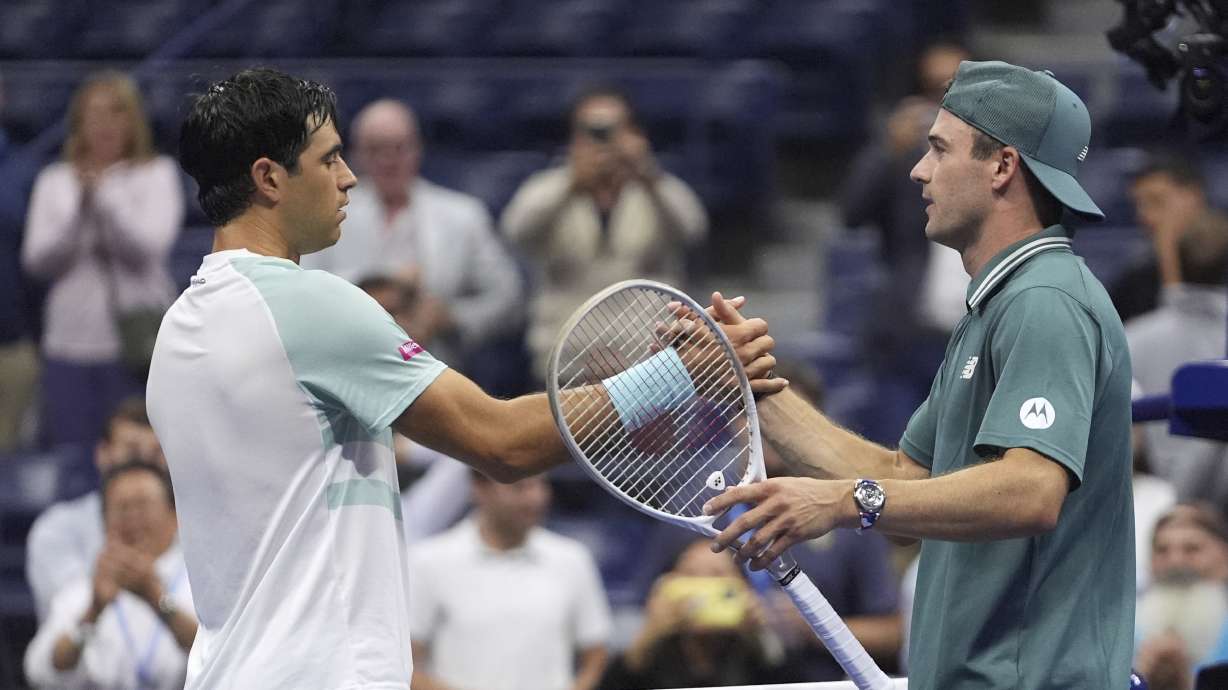 Nuno Borges, left, of Portugal, congratulates Tommy Paul, of the United States, after being defeated by him during the second round of the U.S. Open tennis championships, Thursday, Aug. 28, 2025, in New York.
