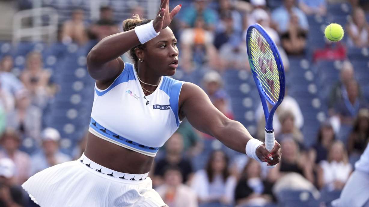 Taylor Townsend, of the United States, returns a shot during her doubles match with her partner, with Katerina Siniakova, of the Czech Republic, against Aldila Sutjiadi, of Indonesia, and Nadiia Kichenok, of Ukraine, in the second round of the U.S. Open tennis championships, Thursday, Aug. 28, 2025, in New York.