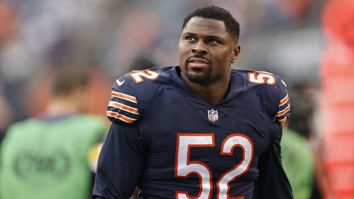 FILE - Chicago Bears outside linebacker Khalil Mack (52) walks off the field after an NFL football game against the Detroit Lions, Oct. 3, 2021, in Chicago.