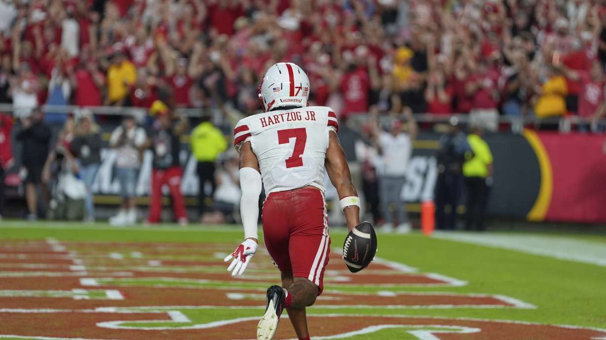 Nebraska defensive back Malcolm Hartzog Jr. (7) celebrates after intercepting a pass intended for Cincinnati wide receiver Caleb Goodie (10) during the second half of an NCAA college football game Friday, Aug. 29, 2025, at Arrowhead Stadium in Kansas City, Mo.