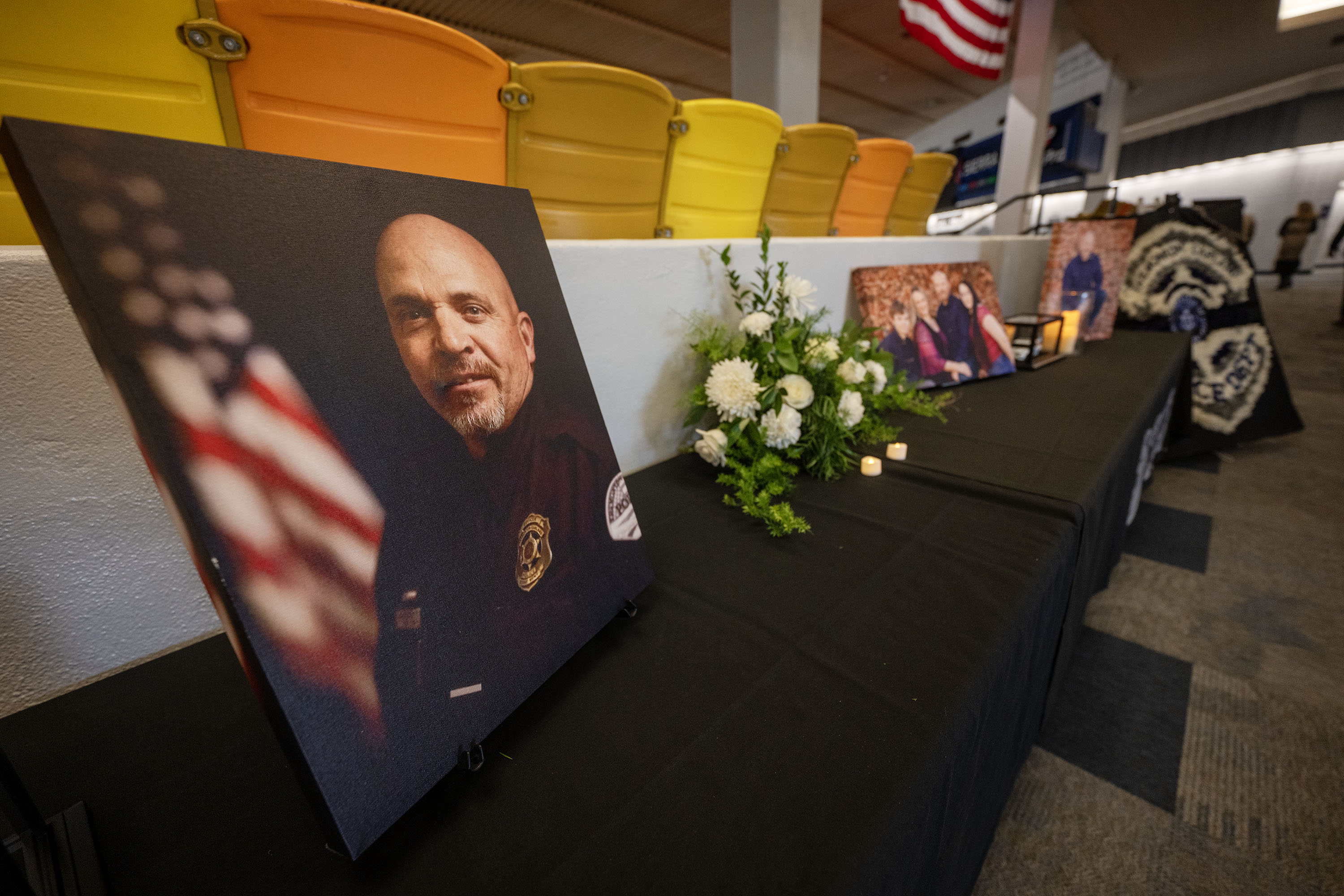 A photo of Tremonton-Garland Police Sgt. Lee Sorensen is shown at his funeral at the Dee Glen Smith Spectrum in Logan on Friday.