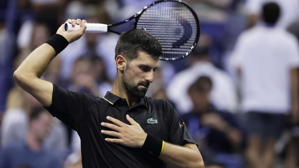 Novak Djokovic, of Serbia, stretches against Cameron Norrie, of Great Britain, during the third round of the U.S . Open tennis championships, Friday, Aug. 29, 2025, in New York.