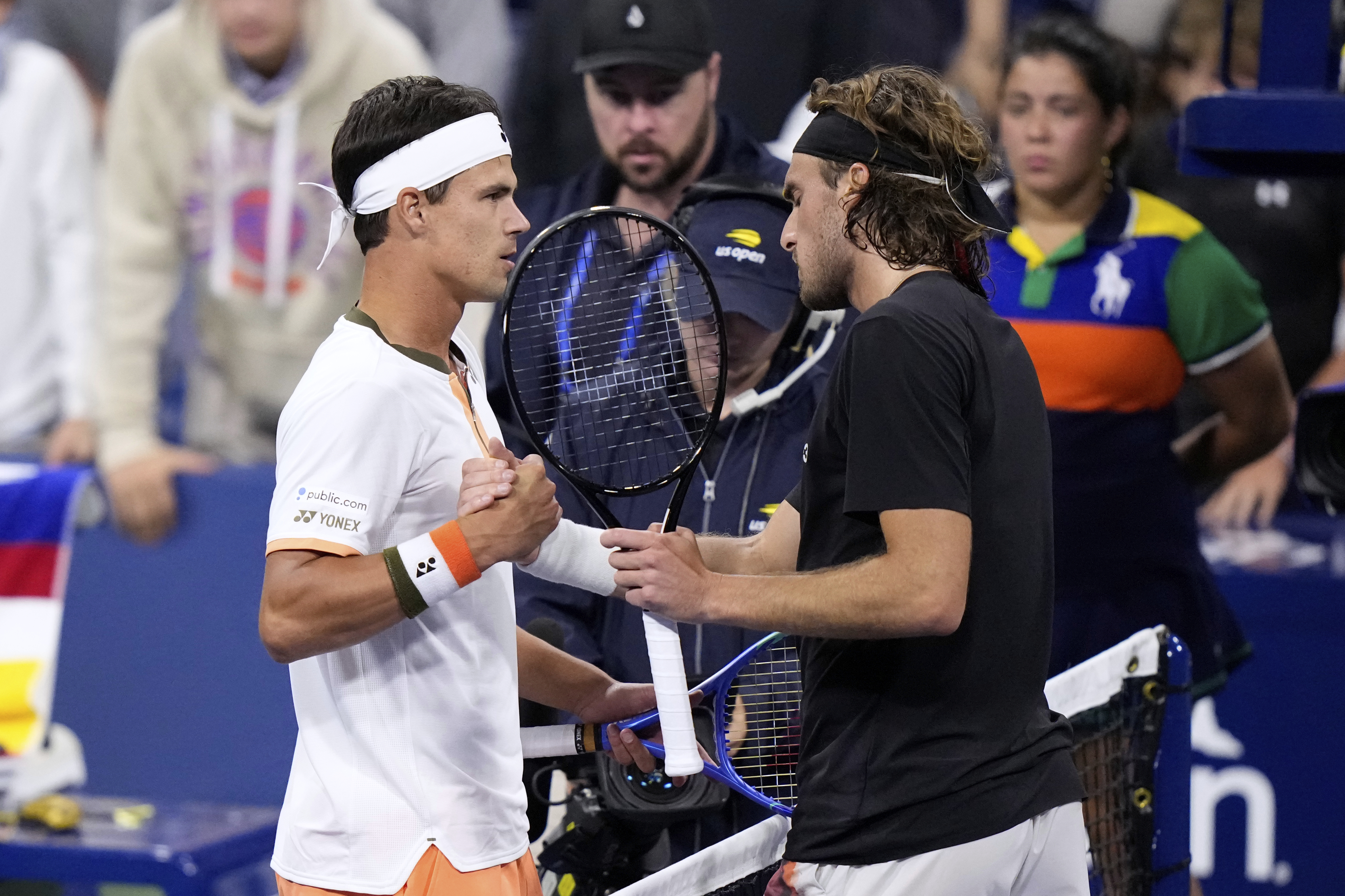 Daniel Altmaier, left, of Germany, is congratulated by Stefanos Tsitsipas, of Greece, after defeating him during the second round of the U.S. Open tennis championships, Thursday, Aug. 28, 2025, in New York. 