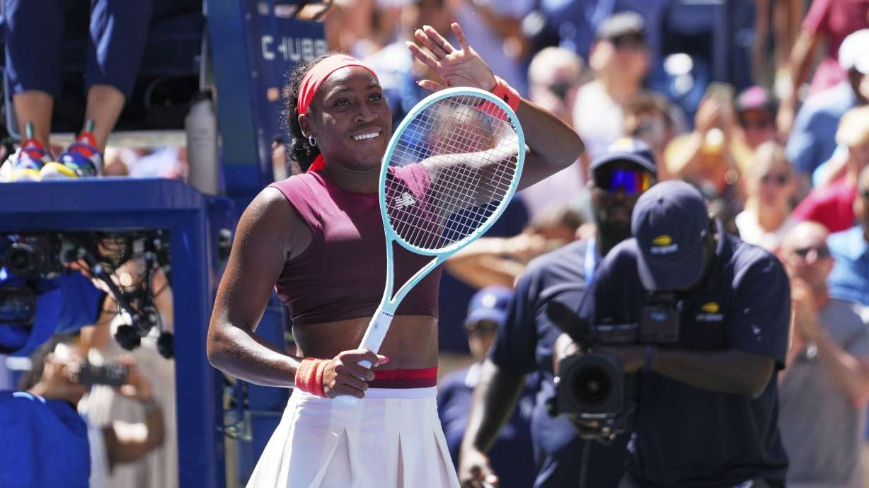 Coco Gauff, of the United States, waves after winning the match point against Magdalena Frech, of Poland, during the third round of the U.S. Open tennis championships, Saturday, Aug. 30, 2025, in New York.