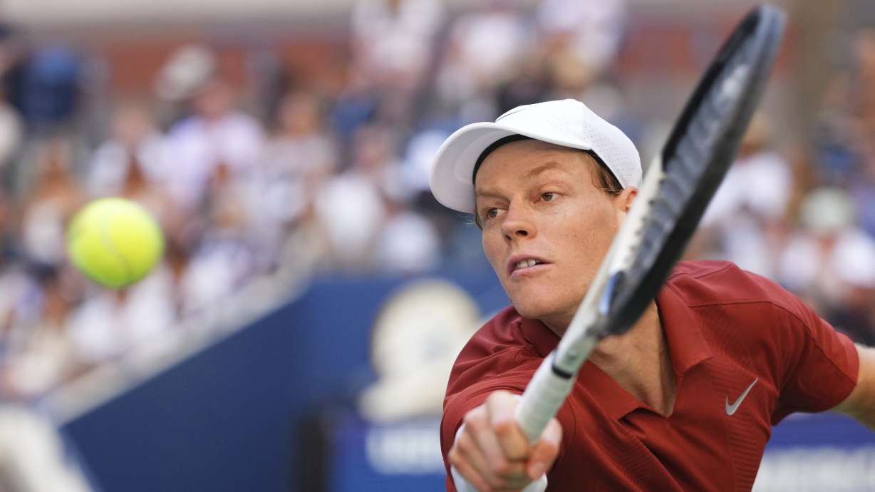 Jannik Sinner, of Italy, returns a shot against Denis Shapovalov, of Canada, during the third round of the U.S. Open tennis championships, Saturday, Aug. 30, 2025, in New York.