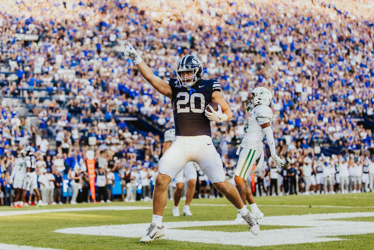BYU tight end Carsen Ryan celebrates a touchdown during the first half of an NCAA college football game, Saturday, Aug. 30, 2025 at LaVell Edwards Stadium in Provo, Utah.