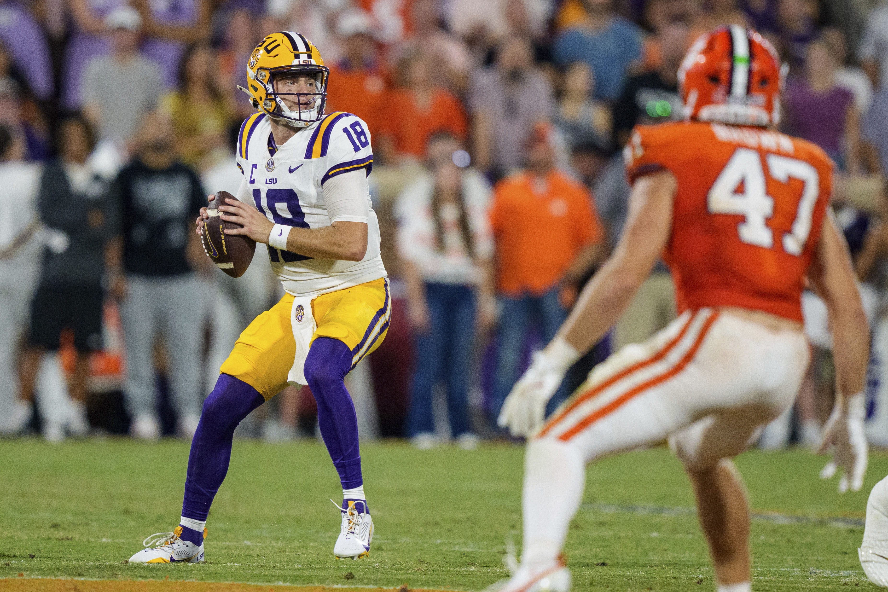 LSU quarterback Garrett Nussmeier (18) looks to pass in the first half of an NCAA college football game against Clemson Saturday, Aug. 30, 2025, in Clemson, S.C. 