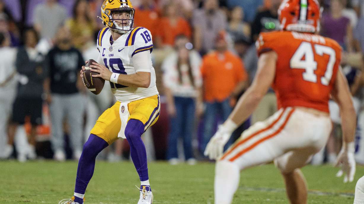 LSU quarterback Garrett Nussmeier (18) looks to pass in the first half of an NCAA college football game against Clemson Saturday, Aug. 30, 2025, in Clemson, S.C.