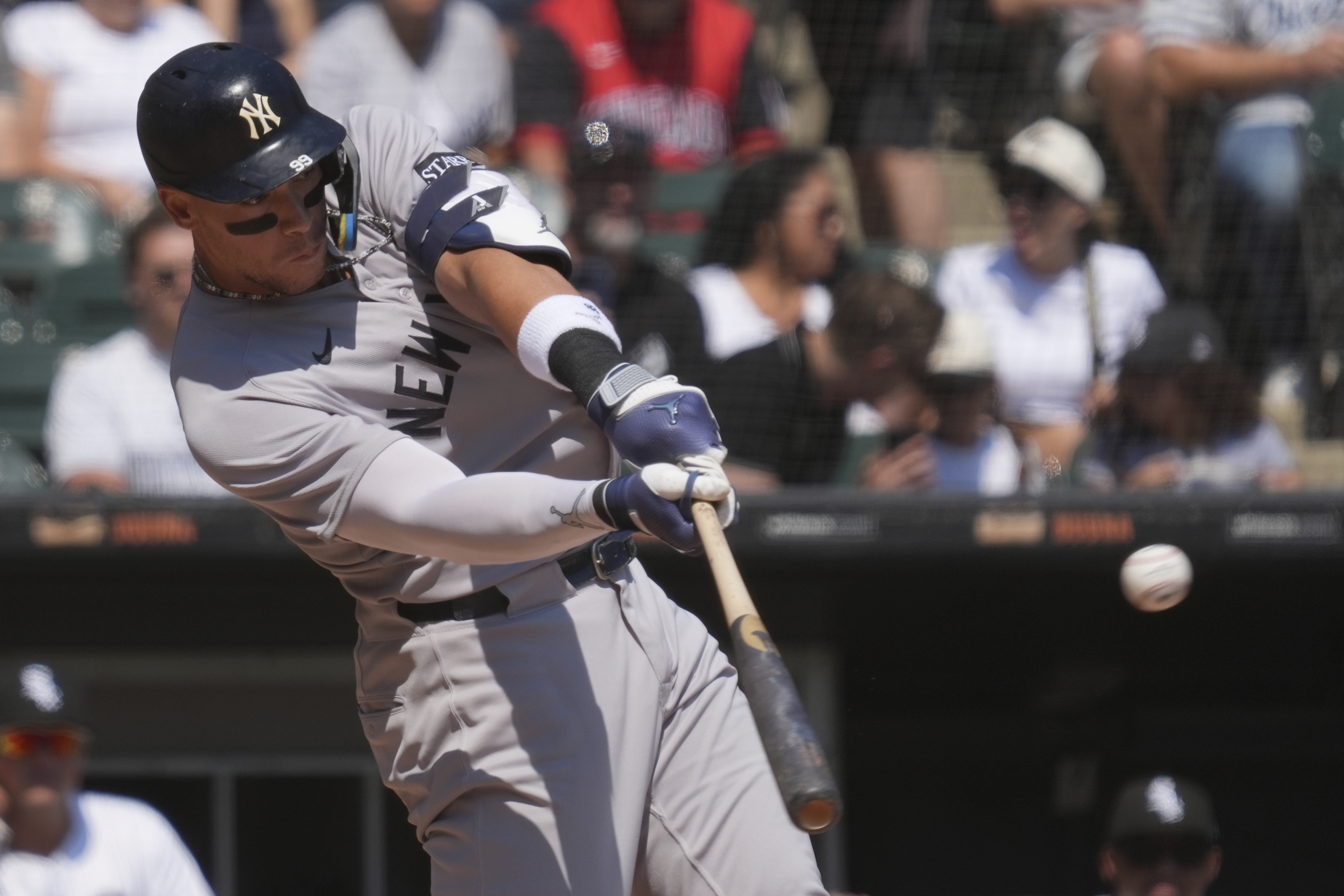 New York Yankees' Aaron Judge hits a solo home run during the first inning of a baseball game against the Chicago White Sox in Chicago, Sunday, Aug. 31, 2025. 