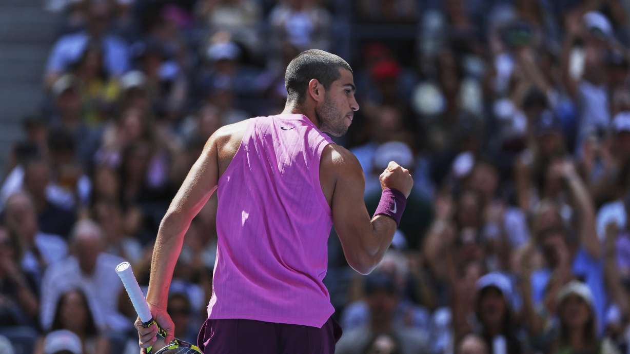 Carlos Alcaraz, of Spain, reacts during his match against Arthur Rinderknech, of France, during the fourth round of the U.S. Open tennis championships, Sunday, Aug. 31, 2025, in New York.