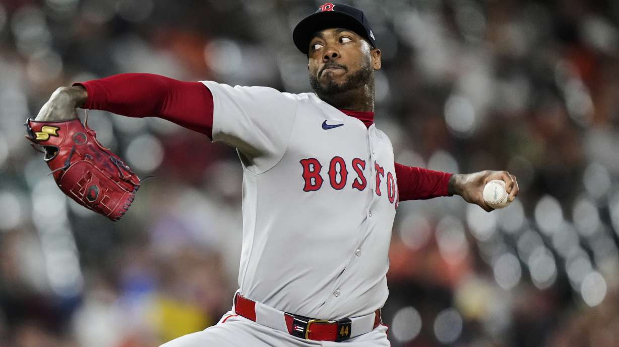 Boston Red Sox relief pitcher Aroldis Chapman delivers during the ninth inning of a baseball game against the Baltimore Orioles, Wednesday, Aug. 27, 2025, in Baltimore.