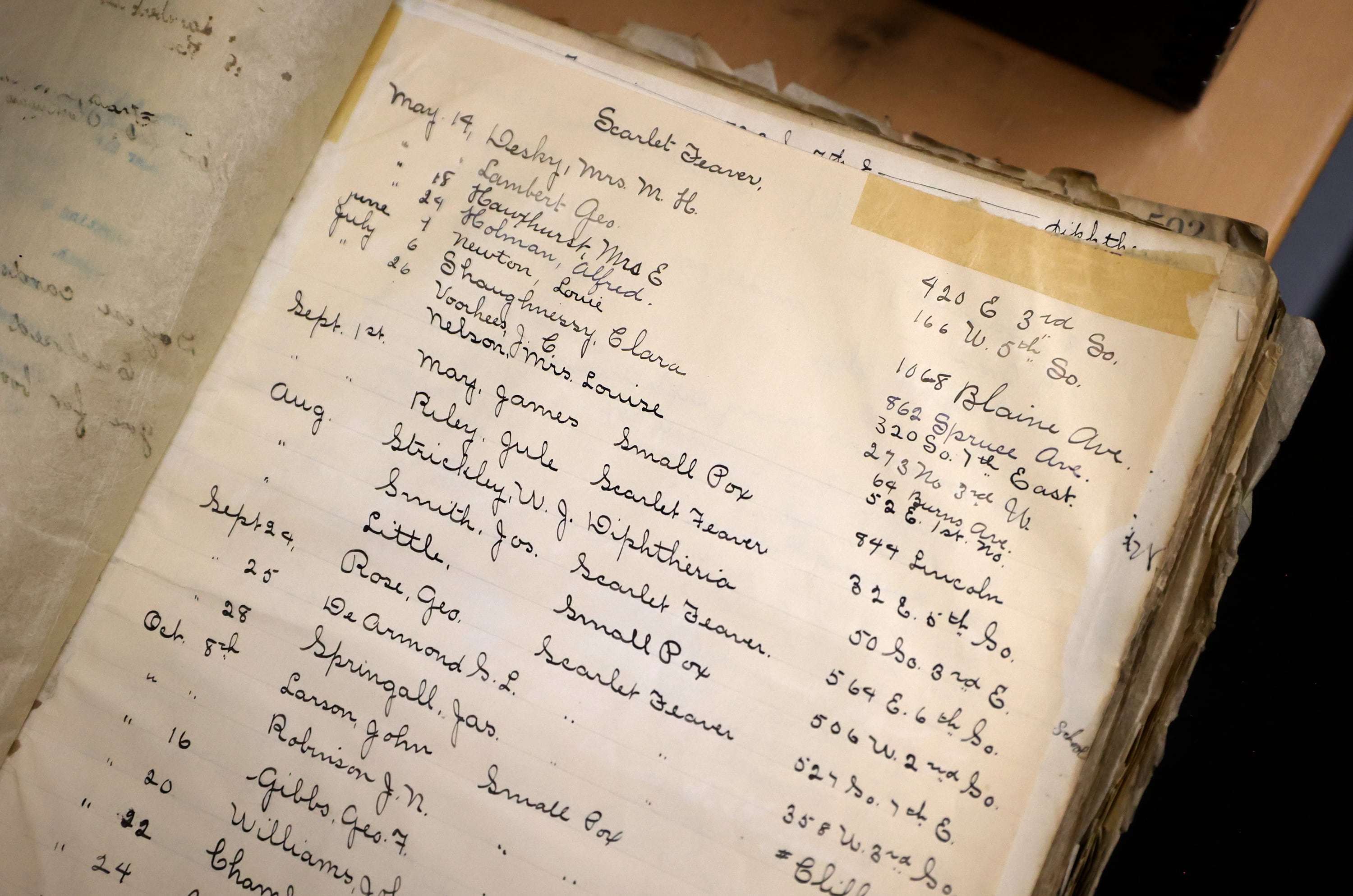 A list of those with scarlet fever, smallpox and diphtheria is pictured in the special collections area of The City Library in Salt Lake City on Aug. 5, 2025. If someone on the list had library materials, the books were burned upon their return in an attempt to stop the spread of disease.
