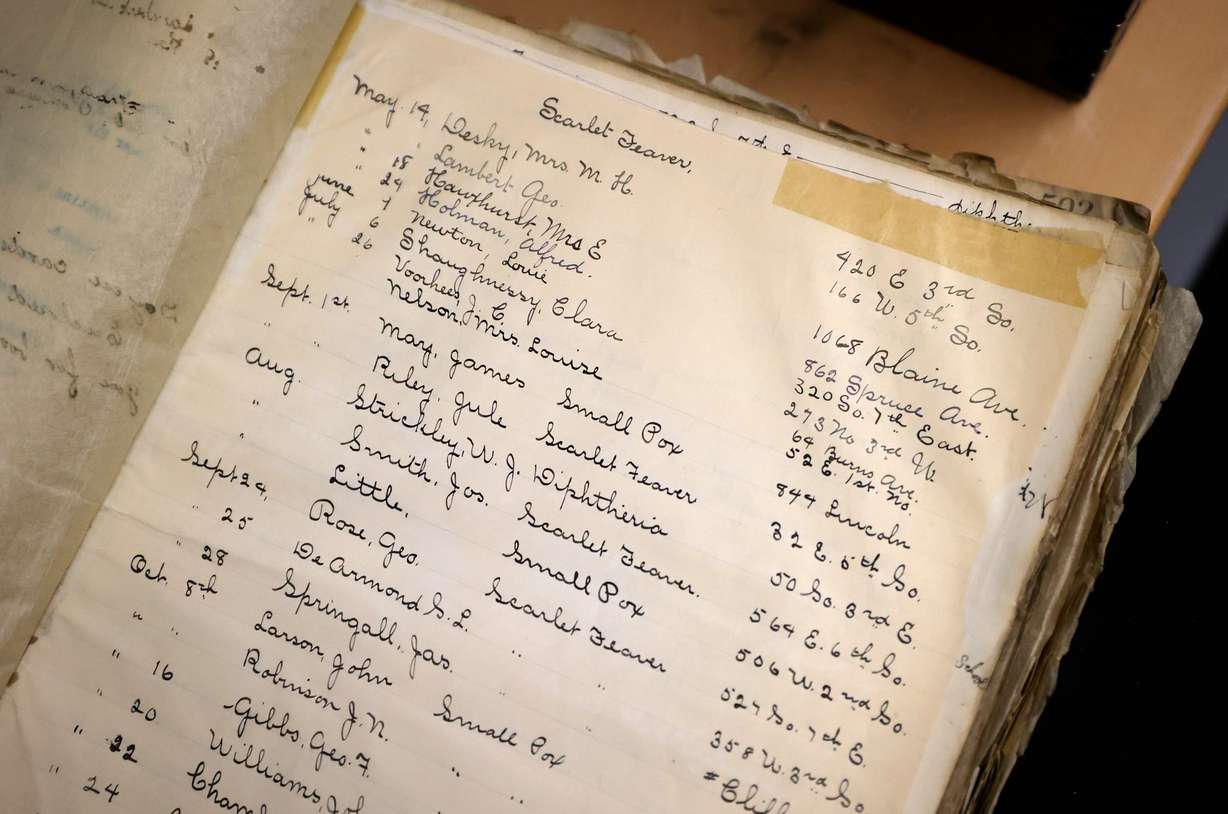 A list of those with scarlet fever, smallpox and diphtheria is pictured in the special collections area of The City Library in Salt Lake City on Aug. 5, 2025. If someone on the list had library materials, the books were burned upon their return in an attempt to stop the spread of disease.