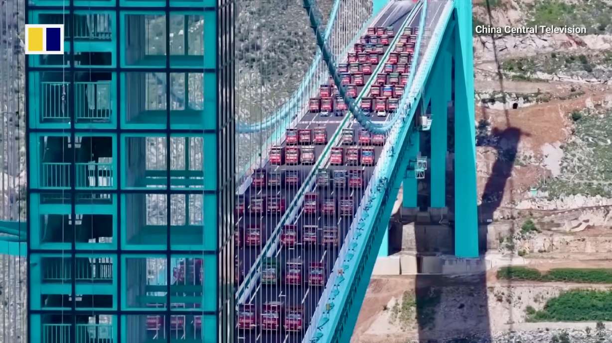 The Huajiang Canyon Bridge in China's Guizhou province, set to open to the public in late September, is the world's highest bridge, offering breathtaking views of the ground below.