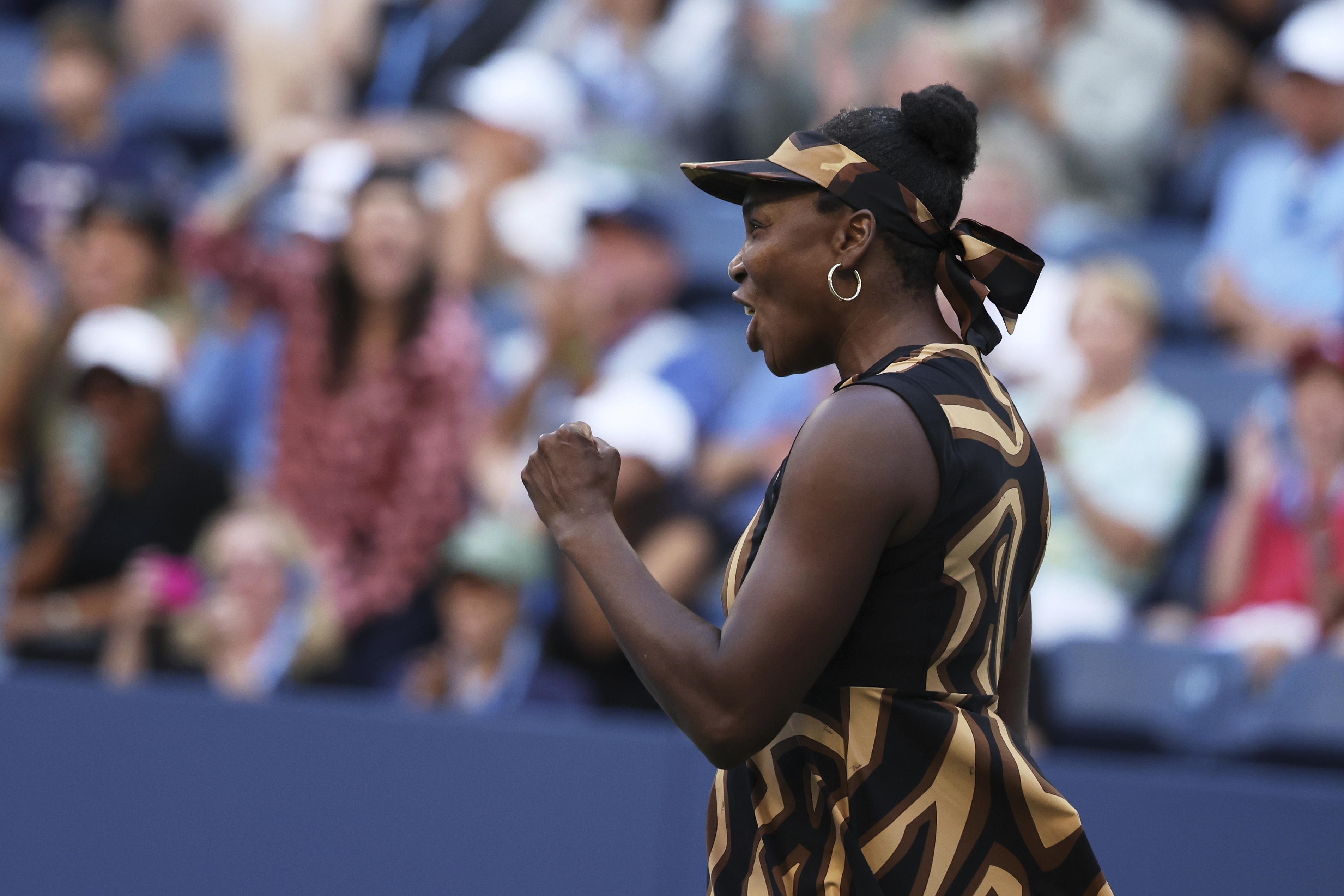 Venus Williams, of the United States, reacts with partner Leylah Fernandez, of Canada, during a third-round doubles match of the U.S. Open tennis championships, Monday, Sept. 1, 2025, in New York. 