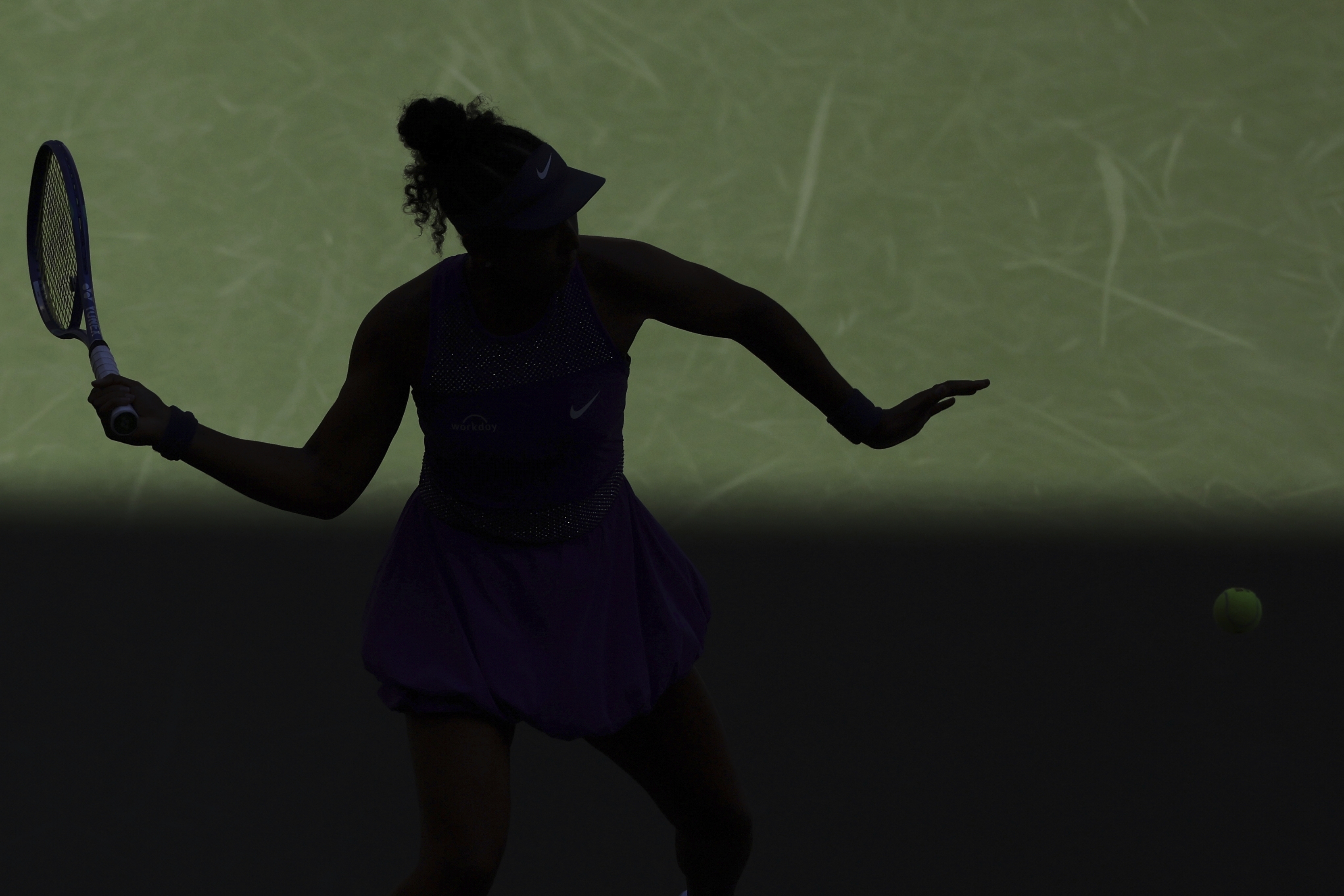 Naomi Osaka, of Japan, returns a shot against Daria Kasatkina, of Australia, during the third round of the U.S. Open tennis championships, Saturday, Aug. 30, 2025, in New York.