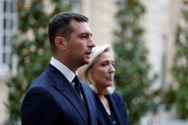 Jordan Bardella and Marine Le Pen speak with the media in Paris, Sept. 2. Both signaled a willingness to work with new Prime Minister Sebastien Lecornu on the budget on Tuesday.