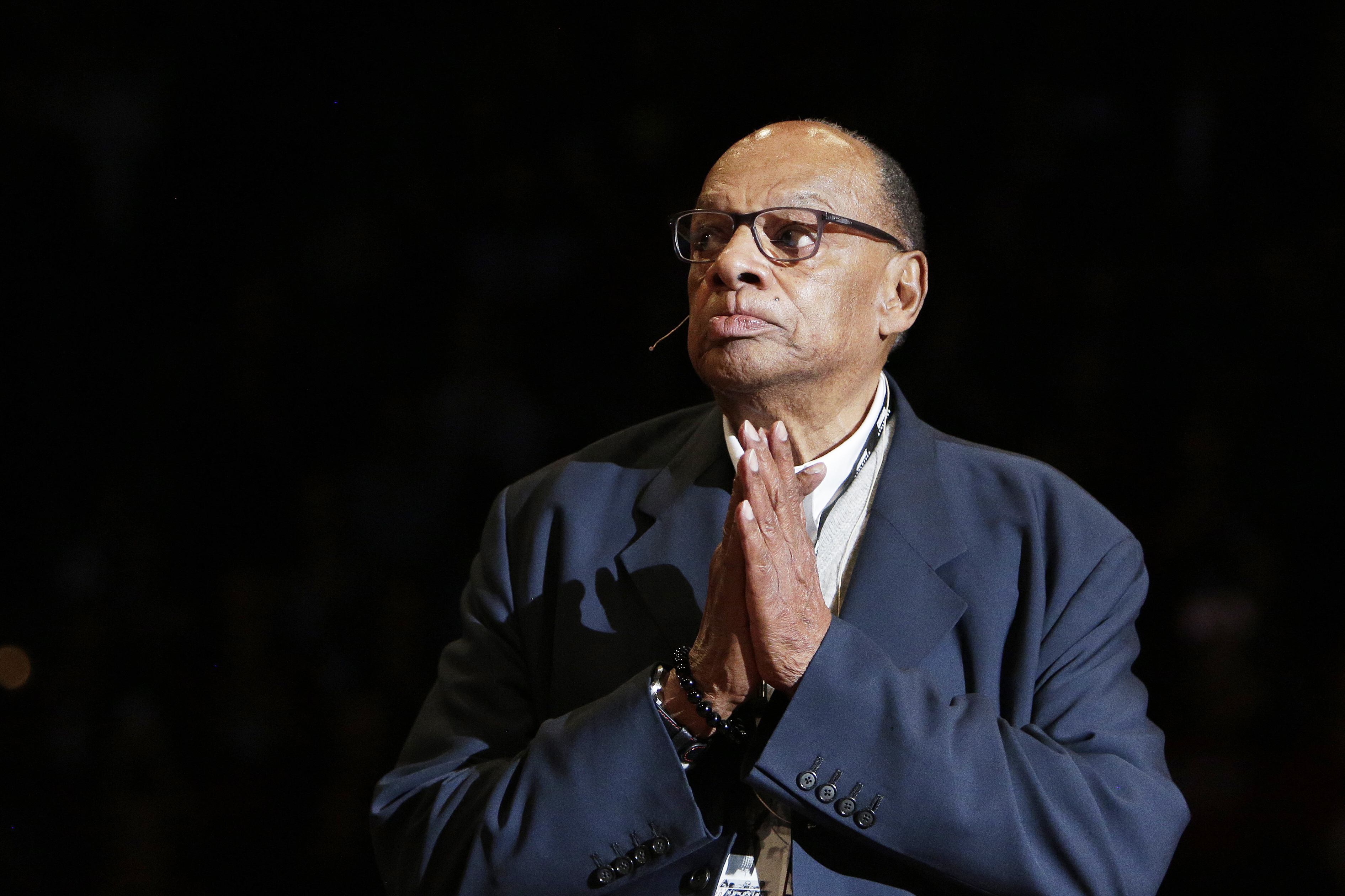 FILE - Former Washington State basketball head coach George Raveling looks on during the school's ceremony to honor him during halftime of an NCAA college basketball game between Washington State and Washington in Pullman, Wash., Feb. 9, 2020.