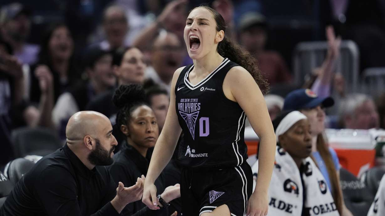 Golden State Valkyries guard Carla Leite reacts after making a 3-point basket during the second half of a WNBA basketball game against the Indiana Fever, Sunday, Aug. 31, 2025, in San Francisco.