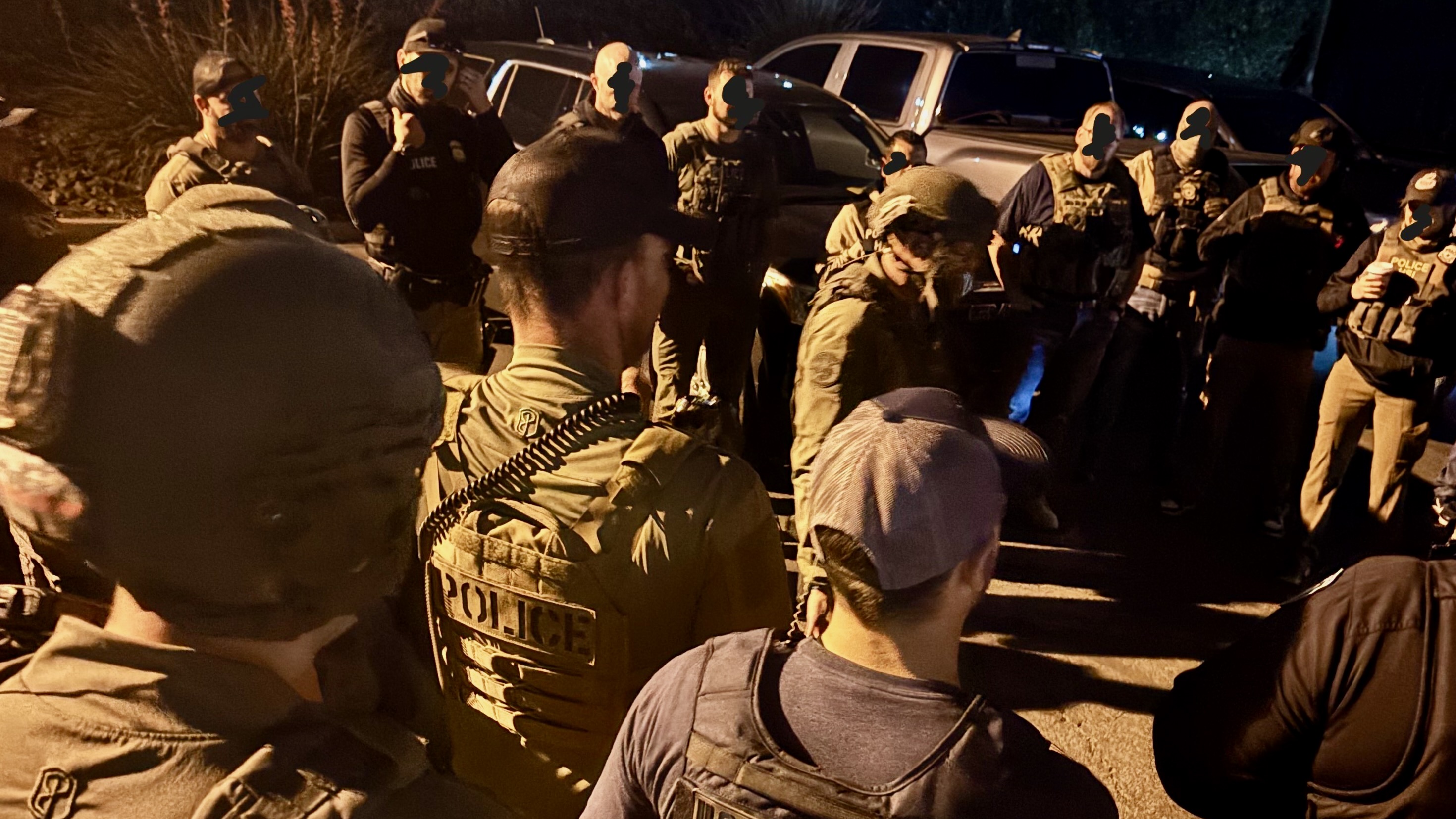 Police and Immigration and Customs Enforcement agents in Washington County on May 14. The ACLU of Utah is voicing concern with increasing cooperation between local law enforcement and federal immigration officials.