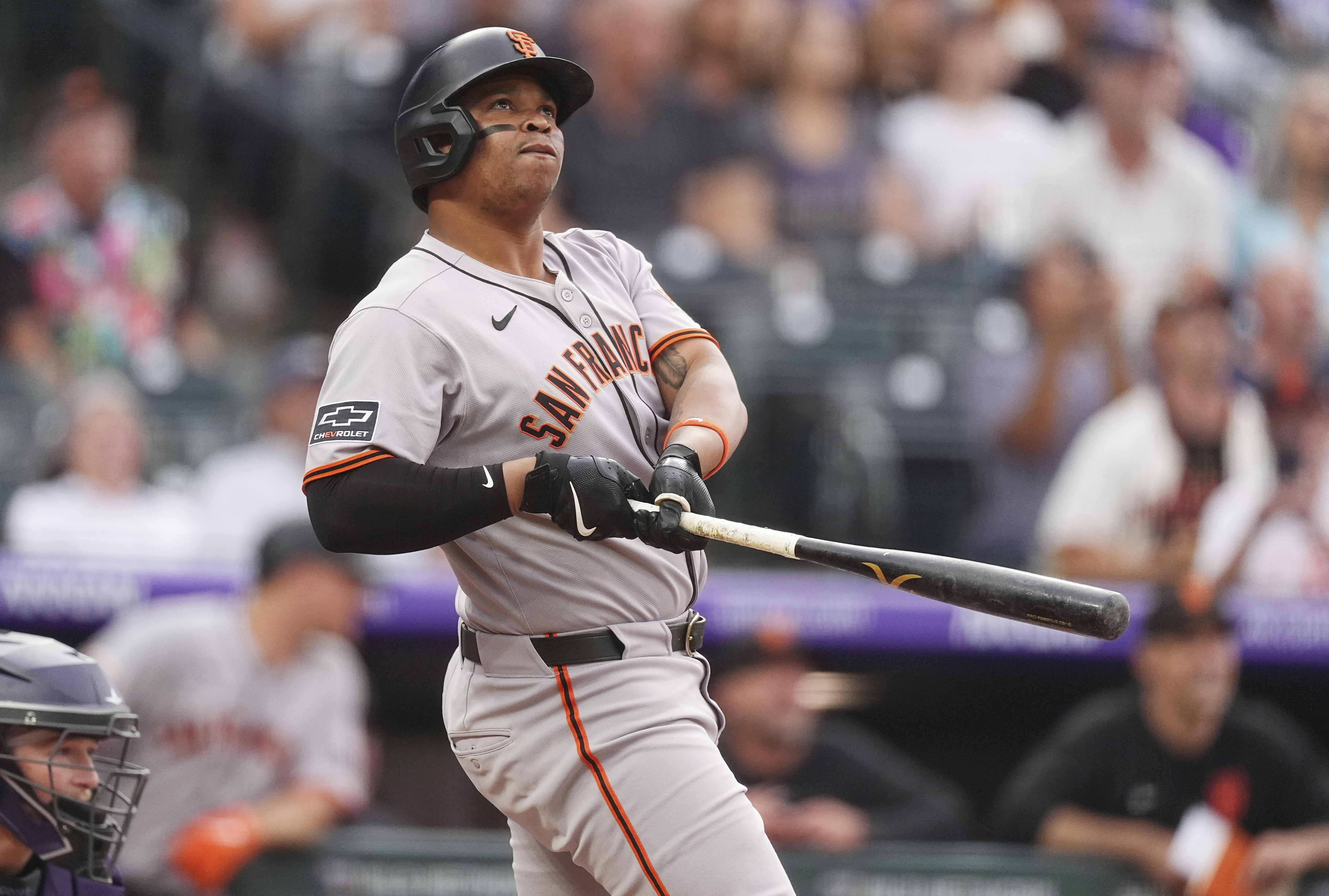 San Francisco Giants' Rafael Devers follows the flight of his two-run home run off Colorado Rockies starting pitcher Kyle Freeland in the first inning of a baseball game Tuesday, Sept. 2, 2025, in Denver.