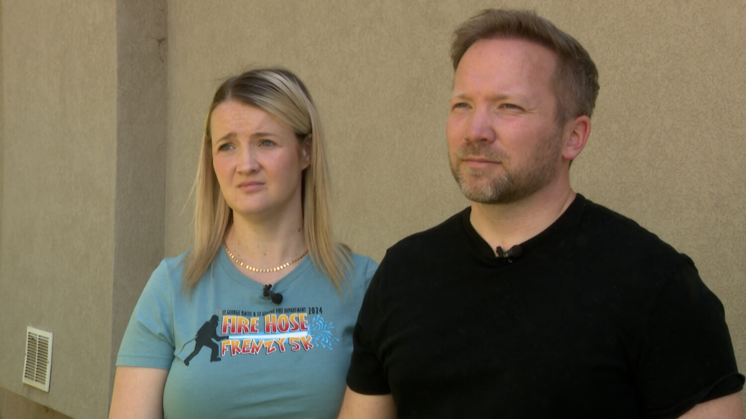 Stephanie and Travisse Hansen speak with KSL-TV on Tuesday. The Hansens are trying to figure out why they were hit the hardest by flooding in their neighborhood on Aug. 27.