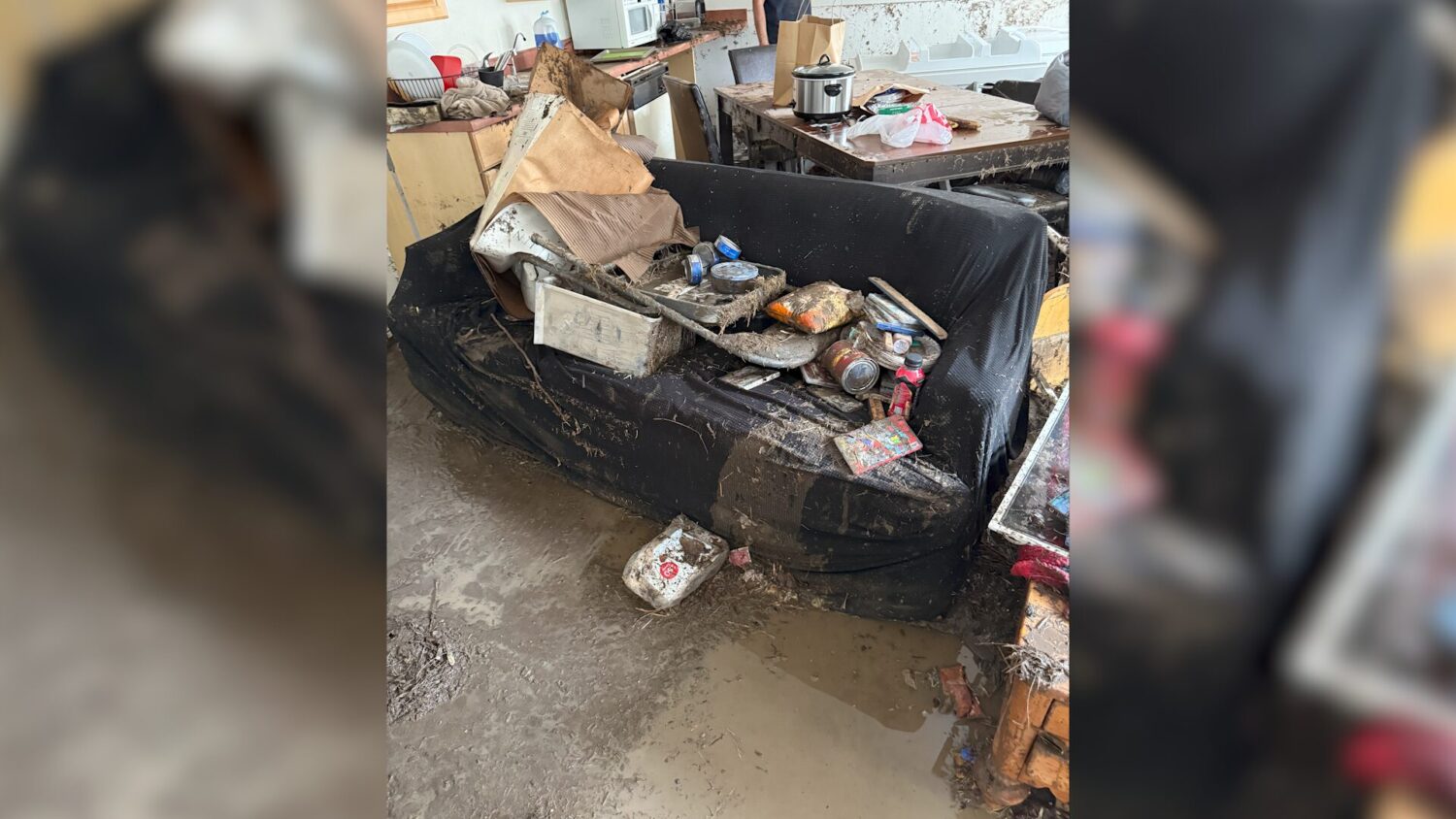 A couch from the basement of the flooded Hansen home in Springville on Aug. 27. The Hansens said the flooding is not covered by insurance.