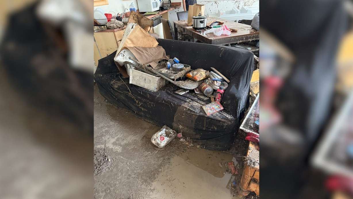A couch from the basement of the flooded Hansen home in Springville on Aug. 27. The Hansens said the flooding is not covered by insurance.