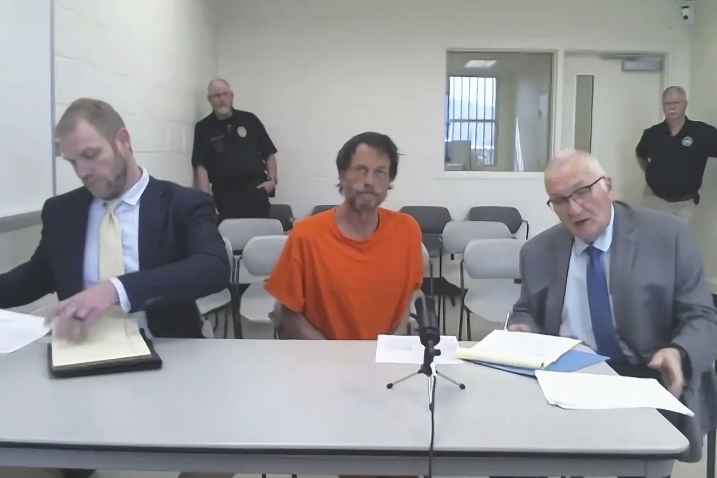 Michael Paul Brown, accused of killing four people at The Owl Bar in Montana, during a virtual court appearance, Aug. 11. Brown was charged with additional crimes, including attempted arson, on Wednesday.