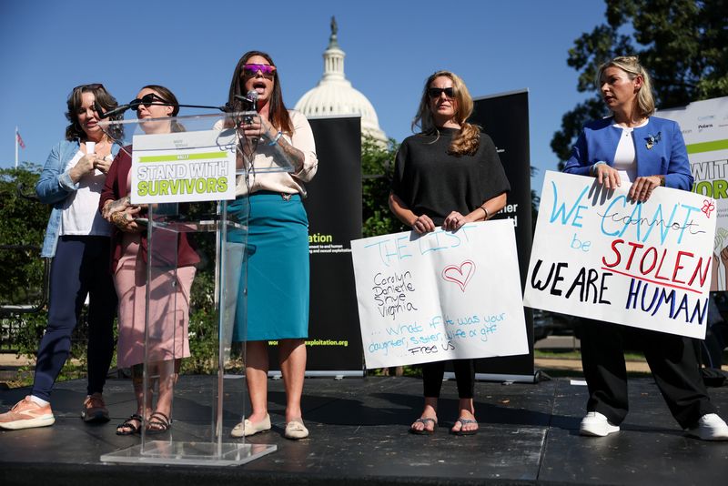 Haley Robson, a Jeffrey Epstein victim, speaks at a rally on Capitol Hill in Washington, Wednesday. Victims of Epstein are demanding Congress to pass legislation forcing the release of all unclassified records related to his death.
