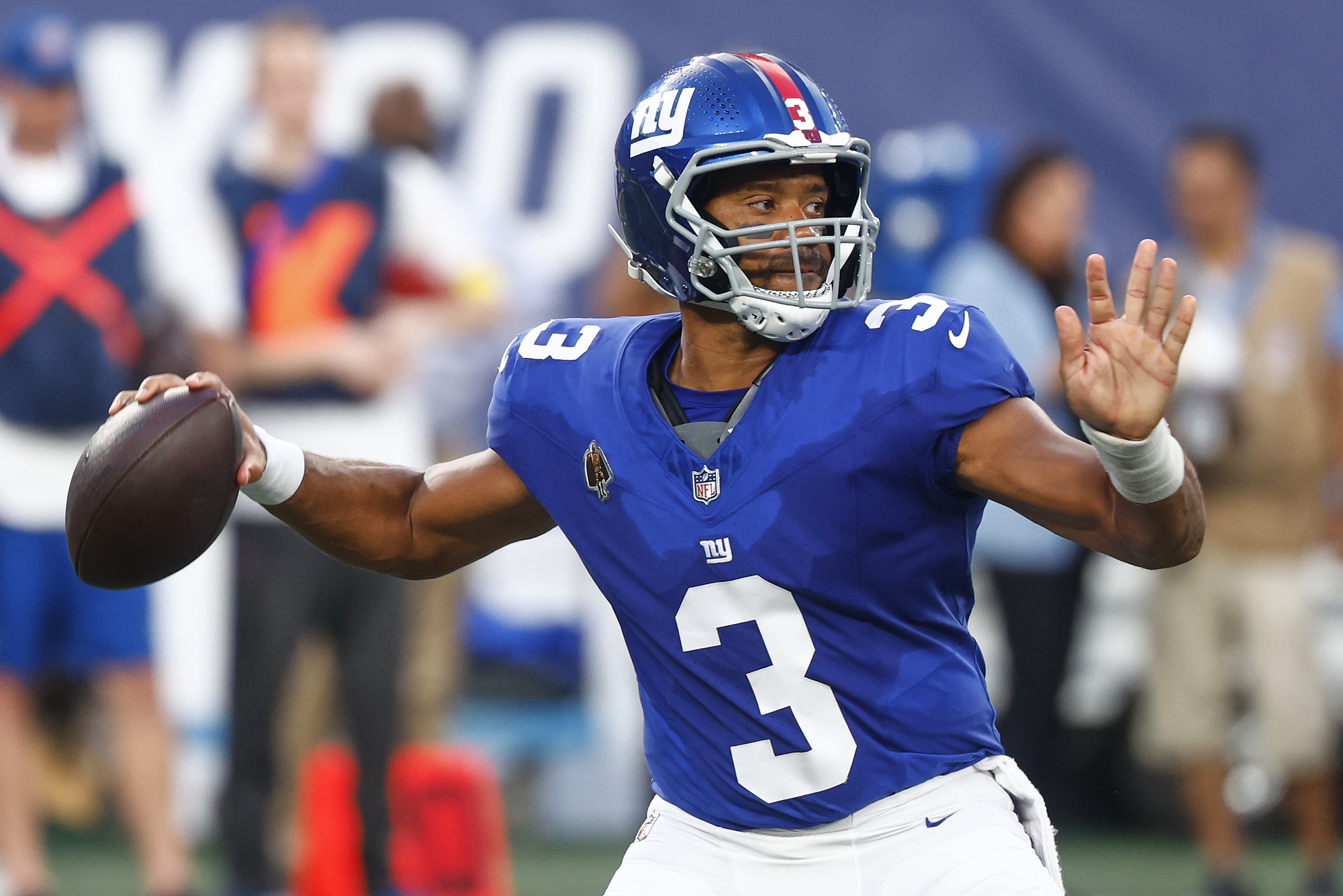 New York Giants quarterback Russell Wilson (3) passes the ball against the New York Jets during the first quarter of an NFL football game, Saturday, Aug. 16, 2025, in East Rutherford, N.J. 