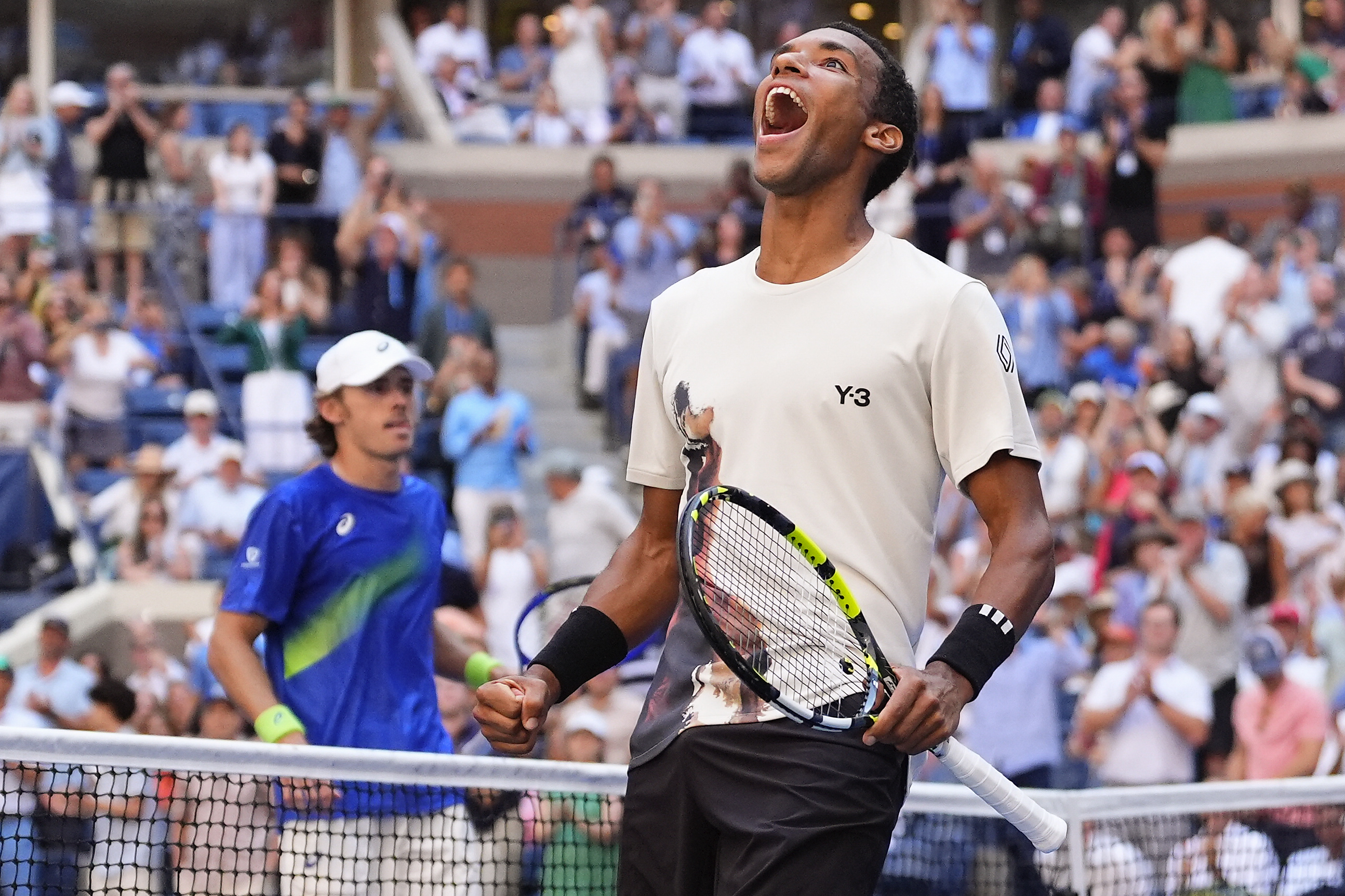 Felix Auger-Aliassime, of Canada, reacts after defeating Alex de Minaur, of Australia, during the quarterfinal round of the U.S. Open tennis championships, Wednesday, Sept. 3, 2025, in New York. 