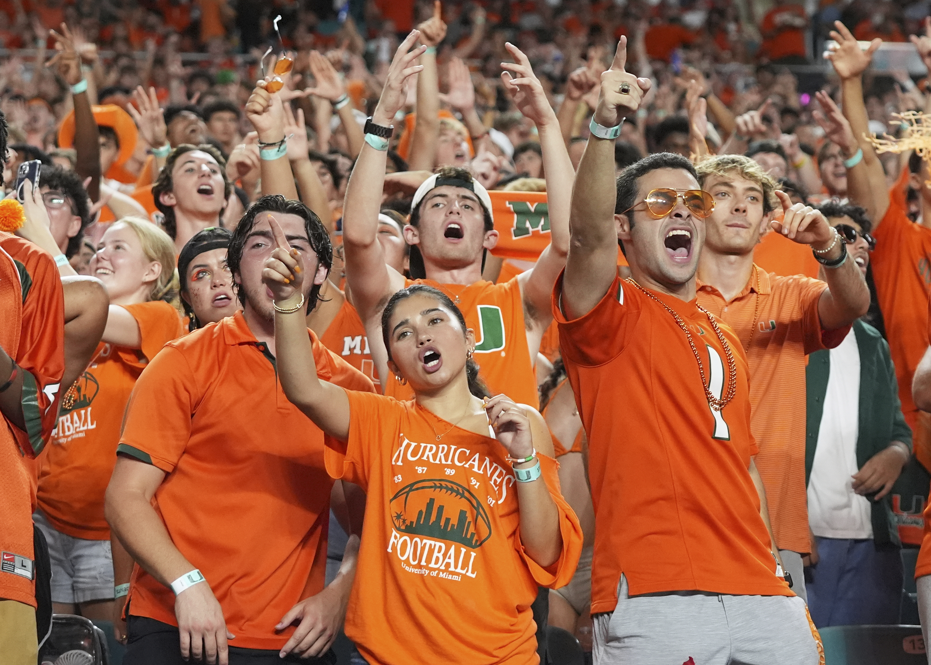 Miami fans cheer during the second half of an NCAA college football game against Notre Dame, Sunday, Aug. 31, 2025, in Miami Gardens, Fla. 
