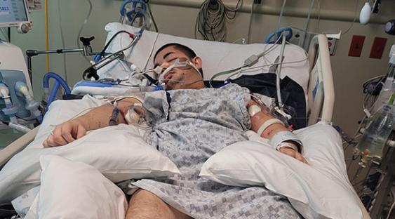 Victor Perez receives care in the hospital following his shooting by police. The Idaho Attorney General’s Office will not file charges against four Pocatello police officers who shot him this spring.
