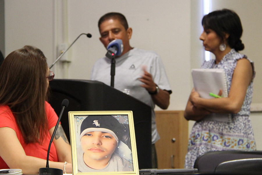 Luis Alicea, Victor Perez’s grandfather, speaks at the Truth & Reconciliation Conference on June 28. The Perez family's attorney said Wednesday it would continue pursuing its civil lawsuit.
